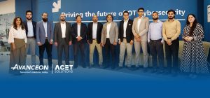 Leadership from Avanceon and ACET Solutions standing for a group picture after formally signing a partnership agreement to strengthen OT security